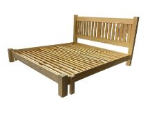 Light ash framed double bedstead (without mattress)