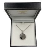 Silver shell and marcasite locket pendant