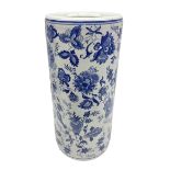 Blue and white umbrella/stick stand decorated with a floral pattern