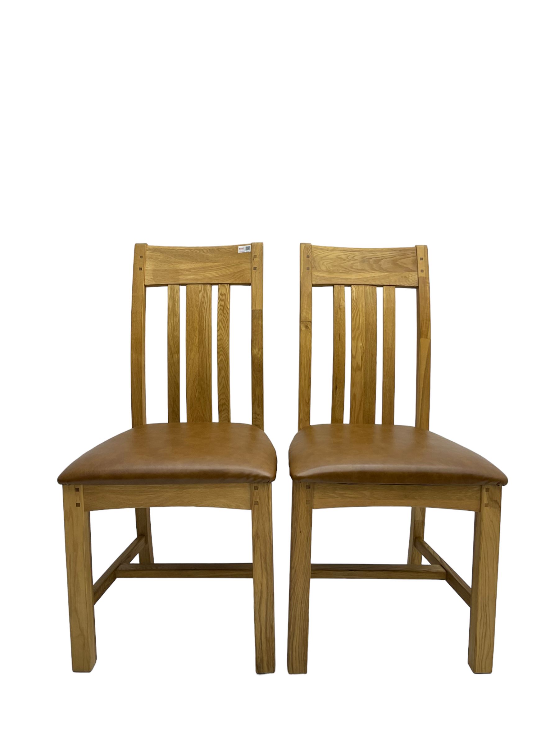 Pair of oak dining chairs