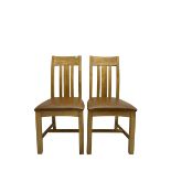 Pair of oak dining chairs