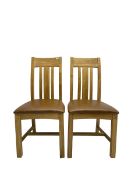 Pair of oak dining chairs