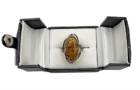 Silver Baltic amber ring with leaf design gallery