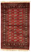 Persian Bokhara crimson ground rug