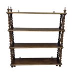 Early 20th century rosewood finish four tier wall rack