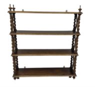 Early 20th century rosewood finish four tier wall rack