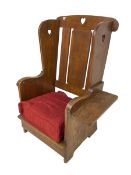 Arts and Crafts design oak reading wingback armchair