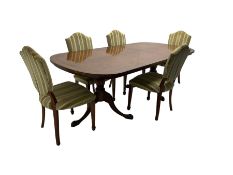 Regency design walnut twin pedestal extending dining table