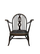 Ercol - tub armchair with pierced fleur-de-lis splat