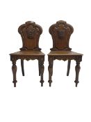 Pair Victorian oak hall chairs