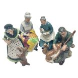 Four Royal Doulton figures