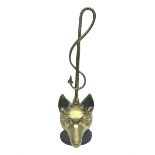 Brass fox mask and hunting whip door stop