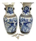 Pair of Chinese blue and white crackle glazed vases decorated with birds in blossoming branches with