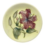 Moorcroft Tiger Lily pattern plate on a yellow ground