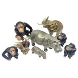 Large Sylvac monkey together with three smaller monkeys