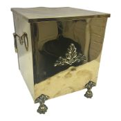 Brass coal box with ring handles and lion feet and hinged lid