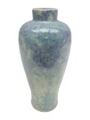Holyrood Pottery vase of bulbous form decorated in a mottled and streaked green and blue glaze