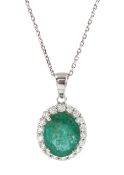 18ct white gold oval emerald and round brilliant cut diamond cluster pendant