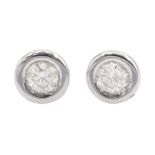 Pair of 14ct white gold bezel set round brilliant cut diamond stud earrings