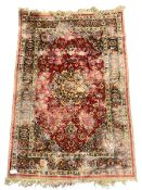 Antique Persian red ground rug