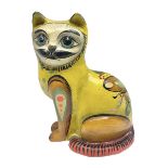 Papier mache model of a sitting cat