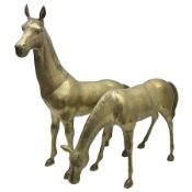 Pair of large brass horse figures
