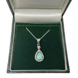 Silver pear shaped opal and cubic zirconia pendant necklace