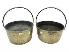 Two large brass jam pans