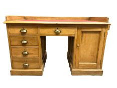 Early 20th century oak 'Headmasters' twin pedestal desk