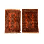 Near pair Afghan Bokhara wool pile rugs