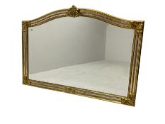 Gilt cushion framed wall mirror