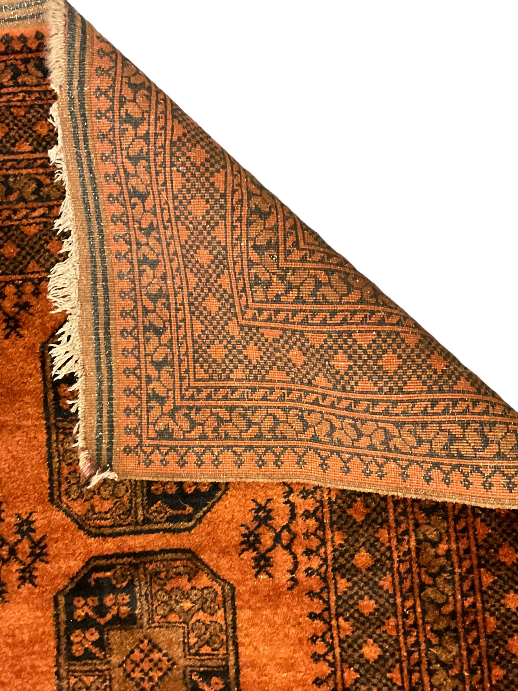 Afghan Bokhara dark amber ground rug - Image 2 of 3