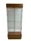 Light oak and glass double display cabinet