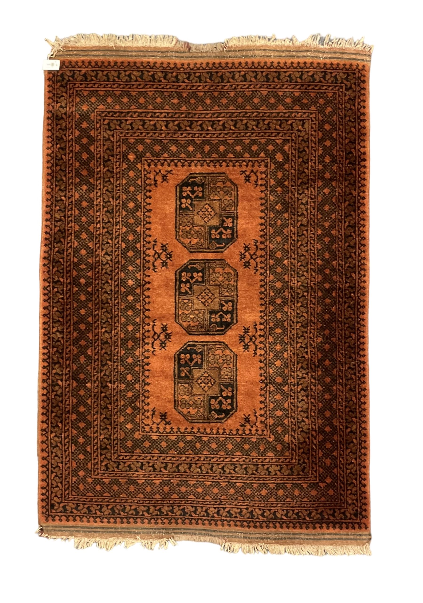 Afghan Bokhara dark amber ground rug