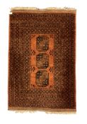 Afghan Bokhara dark amber ground rug