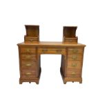 Edwardian walnut kneehole dressing chest