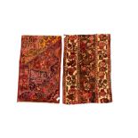 Two Persian crimson ground rugs