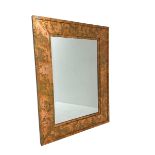 Large copper framed mirror