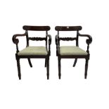 Pair of mahogany regency carver elbow chairs