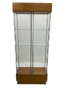 Light oak and glass double open display cabinet