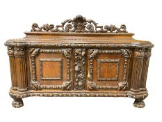 Late 19th century heavily carved walnut sideboard