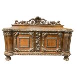 Late 19th century heavily carved walnut sideboard