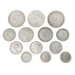 Approximately 100 grams of Great British pre 1947 silver coins including halfcrowns etc