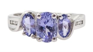 14ct white gold three stone oval cut tanzanite ring