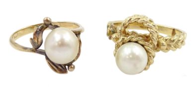 Two gold single stone cultured pearl rings