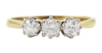 18ct gold three stone round cut diamond ring