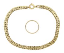 Gold link bracelet and a gold wedding band