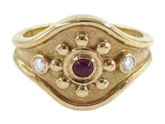 9ct gold three stone cabochon ruby and round brilliant cut diamond ring