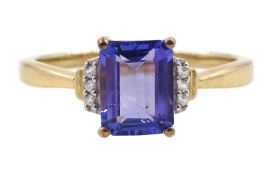 9ct gold emerald cut tanzanite and white zircon ring