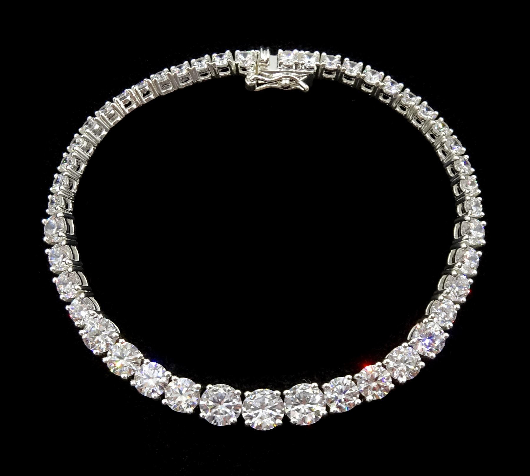 Silver graduating cubic zirconia line bracelet